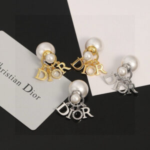 50 Letter Pearl Earrings These Tribales earrings create a new style based on the iconic style DIOR hangs from white resin beads in silverfinish metal with the letter O set in crystal These eyecatching earrings can be matched with styles