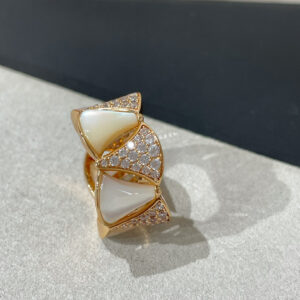 235 b7002 rings sold a lot  Divas double motherofpearl diamond skirt ring a pair of carmounted stones The diamonds are all handset and the logos are all US size 58 This ultrawide version of the ring requires one size up to wear not recommended for those who are looking for a comfortable fit